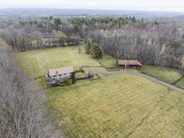 526 Range Rd, Dover-Foxcroft, ME 04426 - view of rural area featuring a heavily wooded area