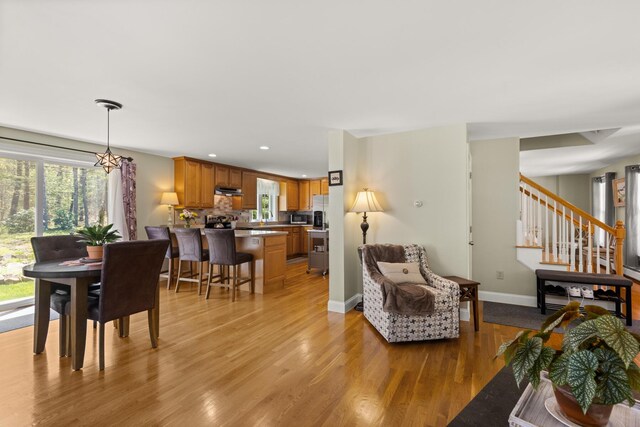 8 Silver Ridge Dr, York, ME 03909 - living area featuring light wood-type flooring, recessed lighting, stairway, and baseboards