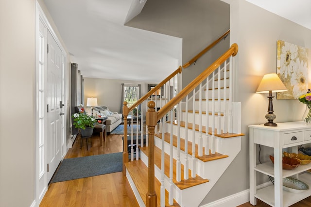8 Silver Ridge Dr, York, ME 03909 - foyer featuring wood finished floors, stairway, and baseboards