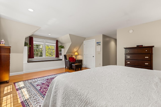 8 Silver Ridge Dr, York, ME 03909 - bedroom featuring wood finished floors, lofted ceiling, baseboards, and recessed lighting
