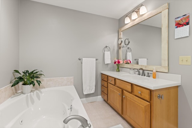 8 Silver Ridge Dr, York, ME 03909 - bathroom featuring vanity, a tub with jets, tile patterned floors, and baseboards
