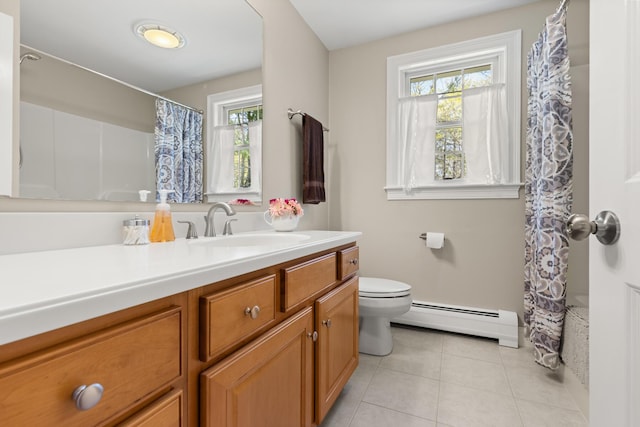 8 Silver Ridge Dr, York, ME 03909 - bathroom with baseboard heating, toilet, tile patterned flooring, and vanity