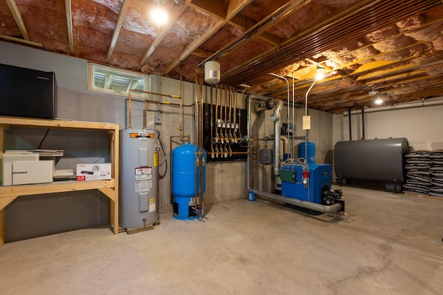 8 Silver Ridge Dr, York, ME 03909 - unfinished below grade area with heating fuel, electric water heater, a water pressure tank, and a heating unit