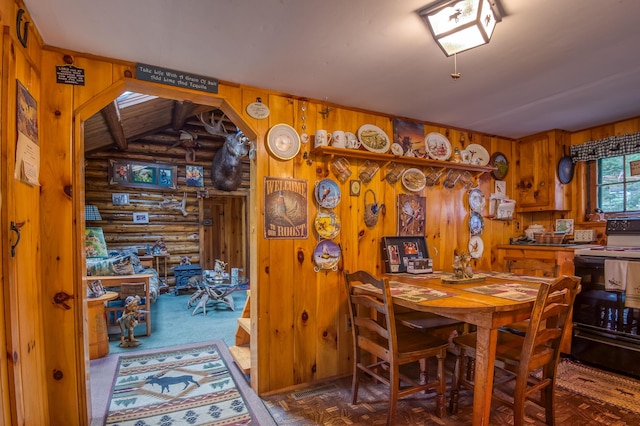 120 S Shore Dr, Rangeley Plt, ME 04970 - dining room featuring wooden walls, log walls, and lofted ceiling