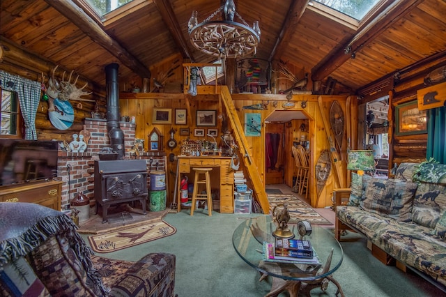 120 S Shore Dr, Rangeley Plt, ME 04970 - living area featuring a skylight, carpet flooring, wood ceiling, a wood stove, and wood walls