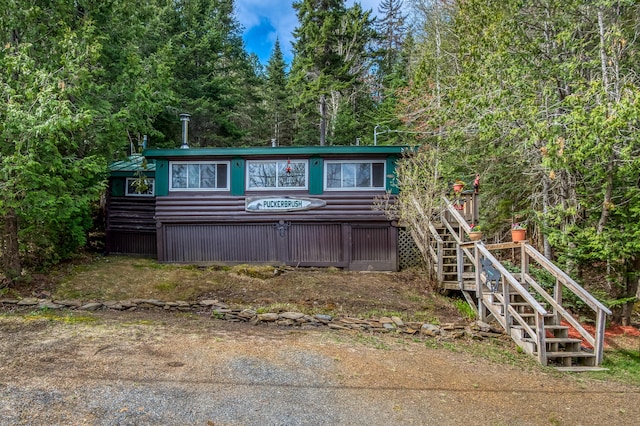 120 S Shore Dr, Rangeley Plt, ME 04970 - view of front of property featuring stairs