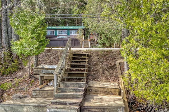 120 S Shore Dr, Rangeley Plt, ME 04970 - back of house featuring stairs, metal roof, and a deck