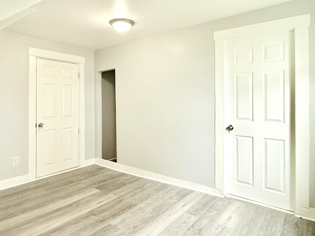 46 French St, Skowhegan, ME 04976 - unfurnished bedroom featuring light wood finished floors and baseboards