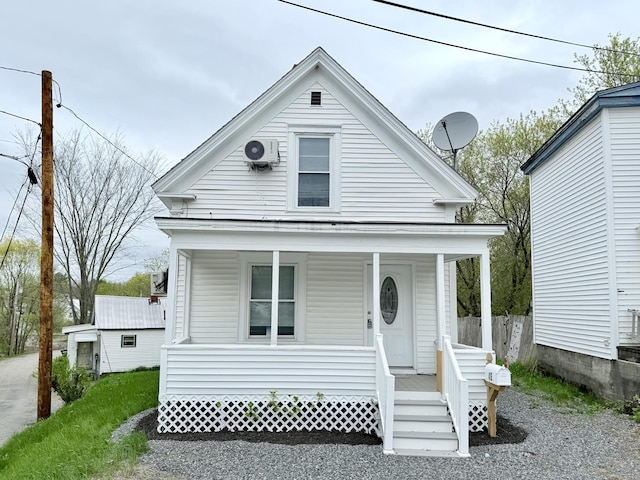 46 French St, Skowhegan, ME 04976 - view of front of house featuring a porch and ac unit