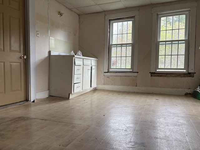 43 Berry Mills Rd, Carthage, ME 04224 - unfurnished room featuring a paneled ceiling