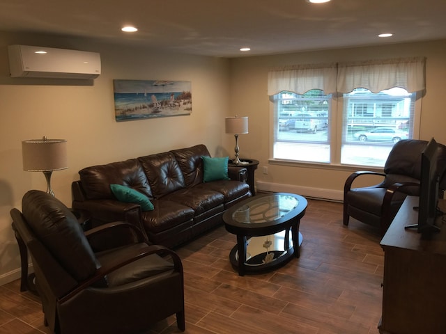 105 Union Ave, Old Orchard Beach, ME 04064 - living area featuring a wall mounted AC, baseboards, wood finished floors, and recessed lighting