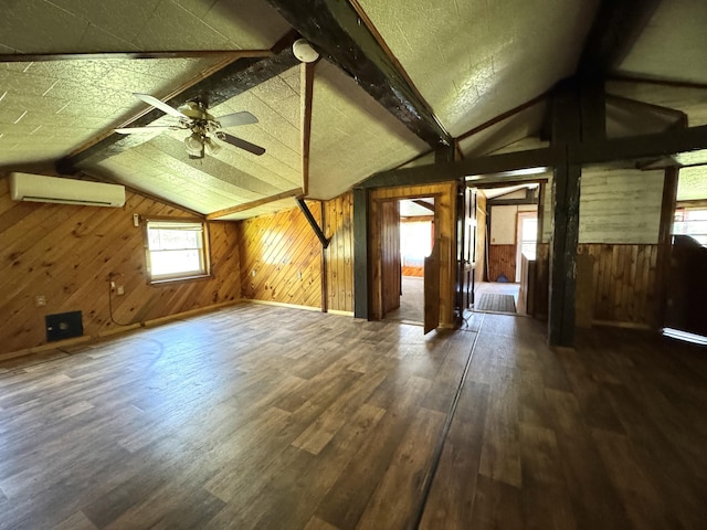7 Thomas Rd, Sangerville, ME 04479 - bonus room with a wall mounted air conditioner, wooden walls, wood finished floors, and a ceiling fan