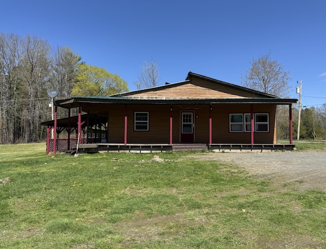 7 Thomas Rd, Sangerville, ME 04479 - farmhouse-style home with a front yard