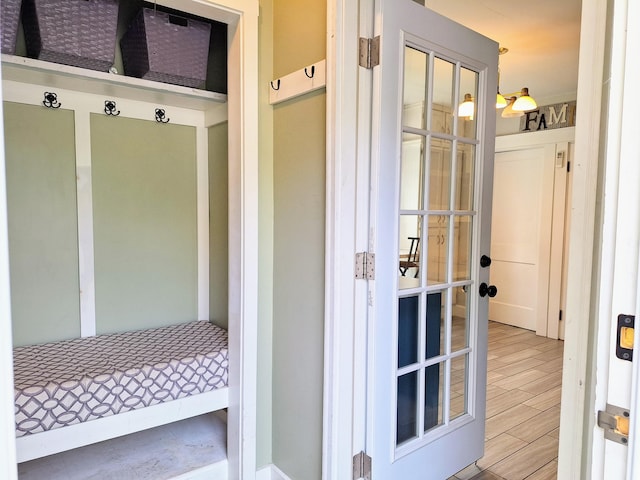 mudroom featuring wood finished floors