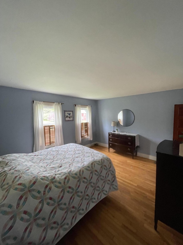 27 Murray St, Bingham, ME 04920 - bedroom with light wood finished floors and baseboards