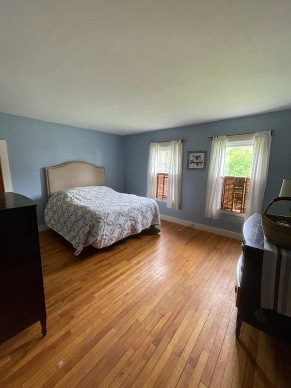 27 Murray St, Bingham, ME 04920 - bedroom with light wood-style floors and baseboards