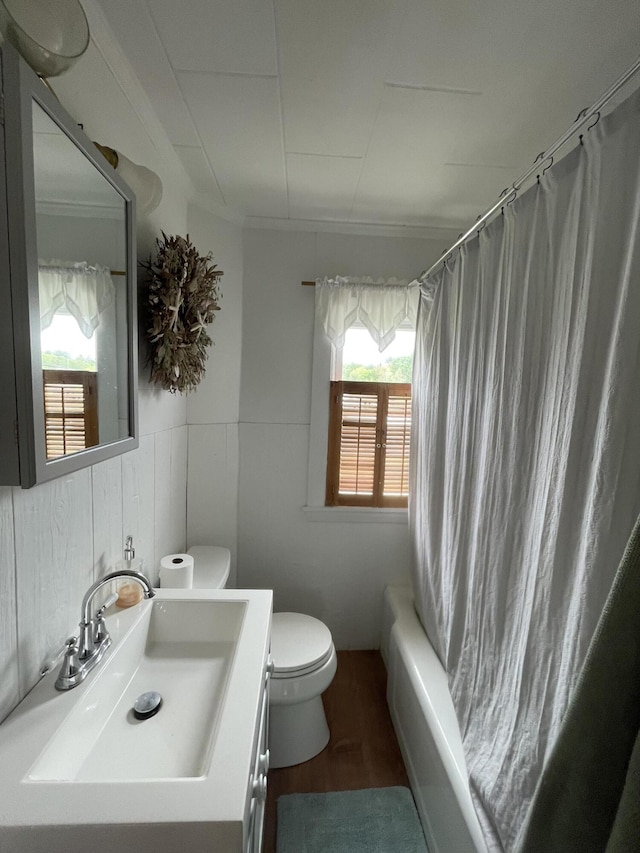 27 Murray St, Bingham, ME 04920 - bathroom featuring vanity, wood finished floors, and shower / bathtub combination with curtain