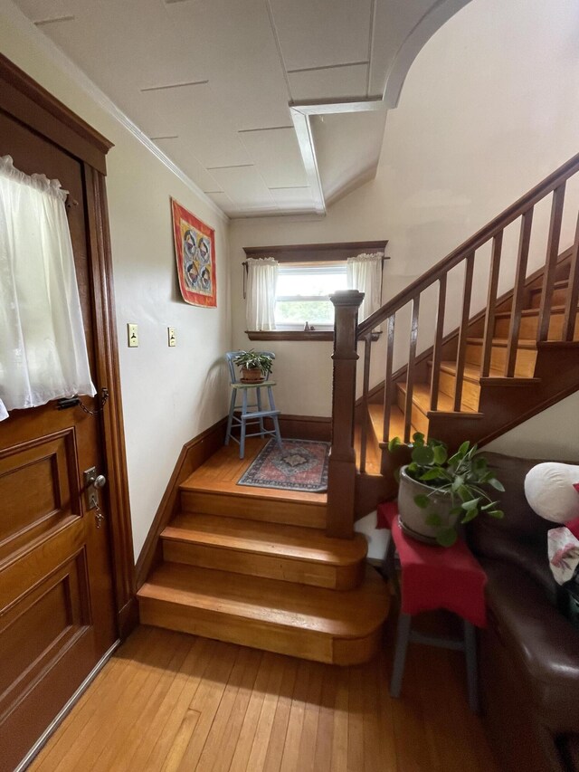 27 Murray St, Bingham, ME 04920 - staircase with hardwood / wood-style flooring and ornamental molding