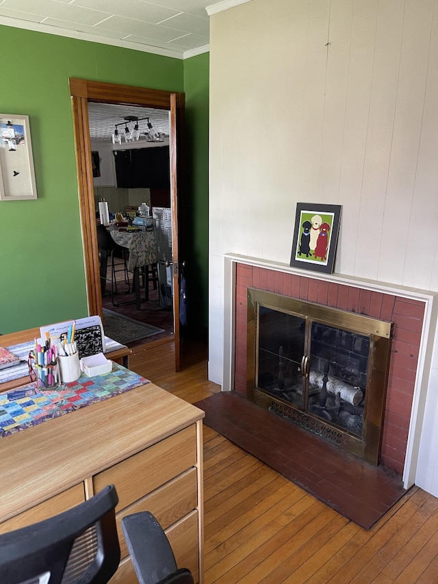 27 Murray St, Bingham, ME 04920 - living area with a fireplace, wood-type flooring, and crown molding