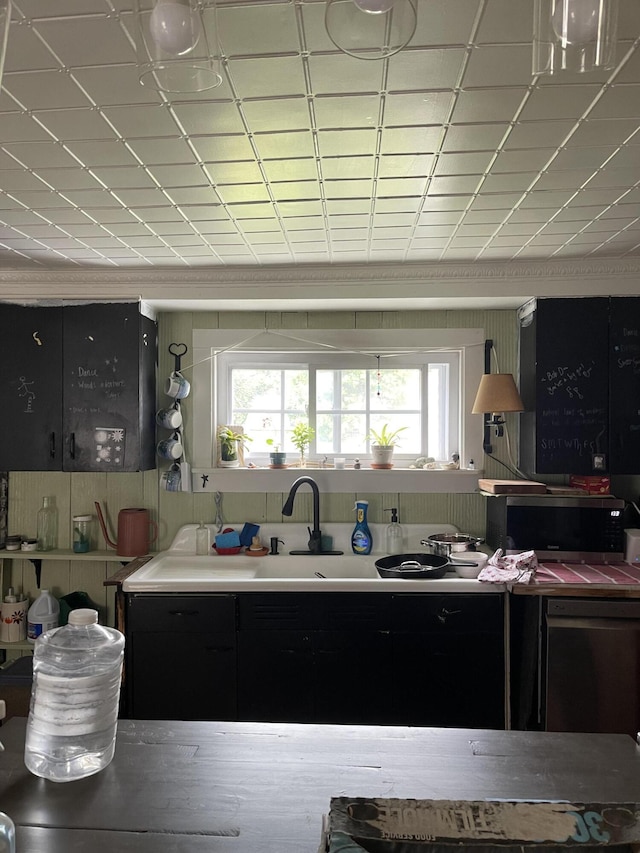 27 Murray St, Bingham, ME 04920 - kitchen with stainless steel microwave and healthy amount of natural light