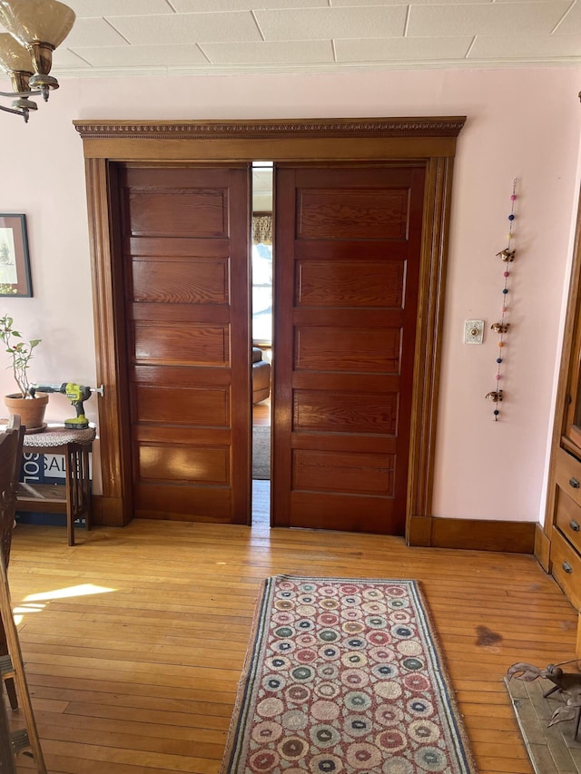 27 Murray St, Bingham, ME 04920 - corridor featuring light wood-style floors and baseboards
