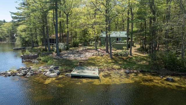 19 Pulpit Rock Rd, Raymond, ME 04071 - dock area featuring a wooded view and a water view