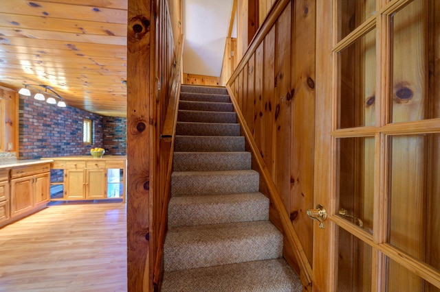 19 Pulpit Rock Rd, Raymond, ME 04071 - stairs with wood finished floors and wooden walls