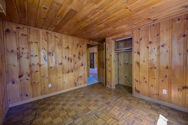 19 Pulpit Rock Rd, Raymond, ME 04071 - spare room featuring wooden walls, baseboards, and wood ceiling