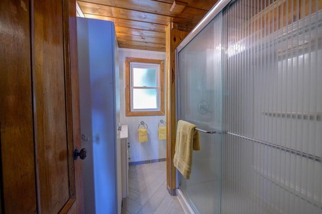 19 Pulpit Rock Rd, Raymond, ME 04071 - bathroom featuring a stall shower, vanity, and wood ceiling