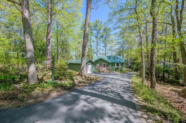19 Pulpit Rock Rd, Raymond, ME 04071 - view of front facade featuring driveway and a garage
