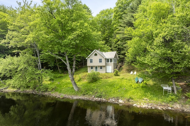 67 Day Mountain Rd, Temple, ME 04984 - view from above of property with a large body of water and a forest