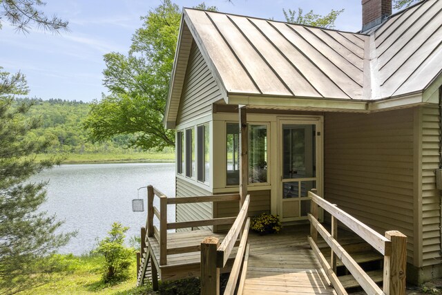 67 Day Mountain Rd, Temple, ME 04984 - deck with a water view and a view of trees