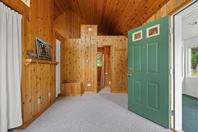 67 Day Mountain Rd, Temple, ME 04984 - carpeted foyer featuring wooden walls, lofted ceiling, and wood ceiling