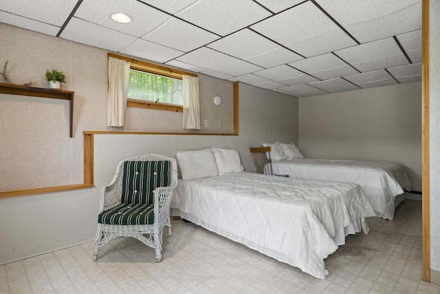 67 Day Mountain Rd, Temple, ME 04984 - bedroom featuring tile patterned floors and a paneled ceiling