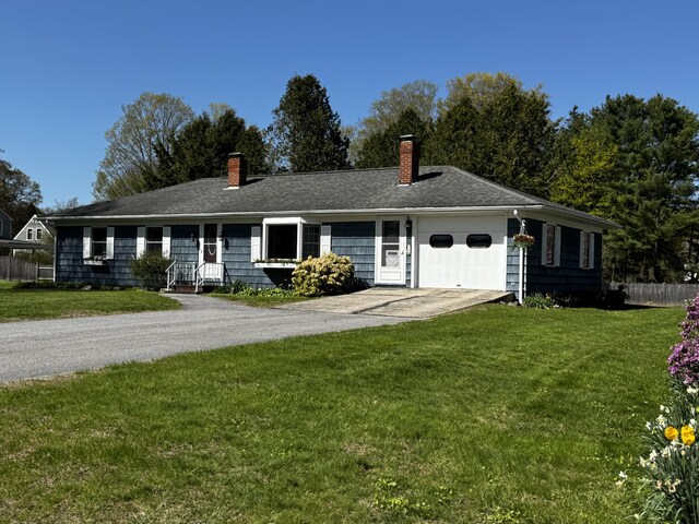 18 Rand Rd, Yarmouth, ME 04096 - ranch-style home with a chimney, driveway, and an attached garage