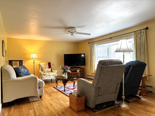 18 Rand Rd, Yarmouth, ME 04096 - living room with a ceiling fan, light wood finished floors, and baseboard heating