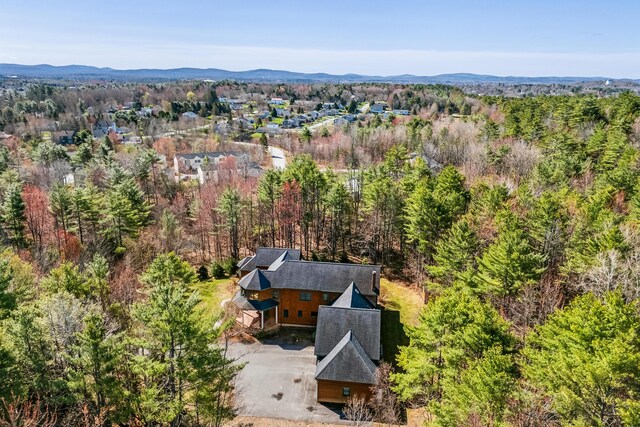 1026 Essex St, Bangor, ME 04401 - aerial view of property and surrounding area with a forest