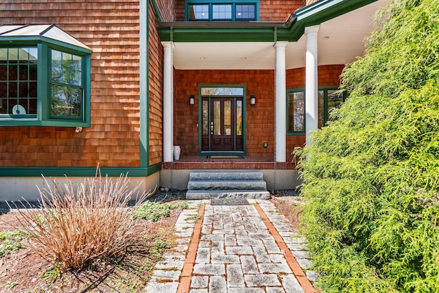 1026 Essex St, Bangor, ME 04401 - doorway to property featuring a porch