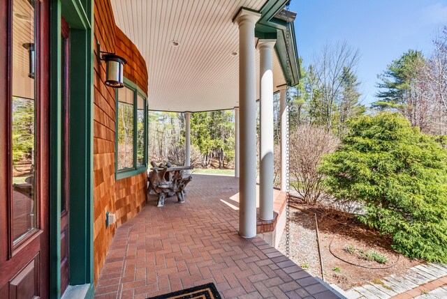 1026 Essex St, Bangor, ME 04401 - view of patio / terrace featuring covered porch