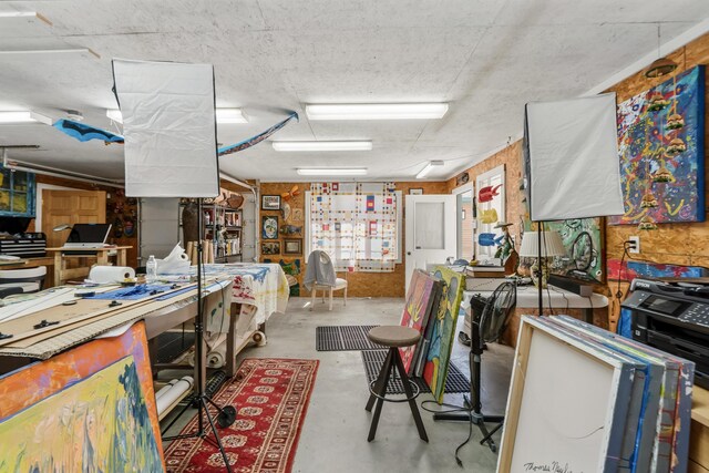 1026 Essex St, Bangor, ME 04401 - miscellaneous room featuring concrete flooring and a workshop area