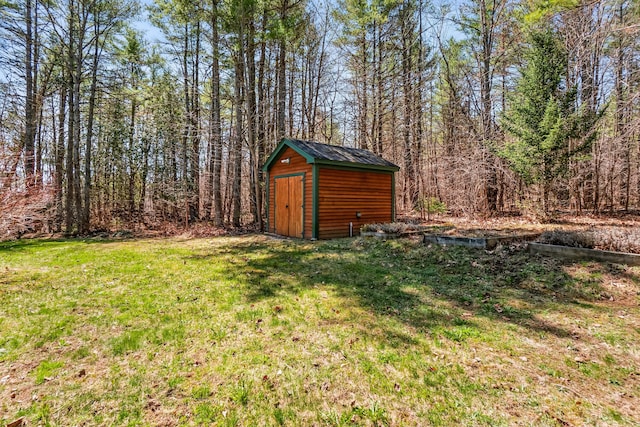 1026 Essex St, Bangor, ME 04401 - view of green lawn with a shed and an outbuilding