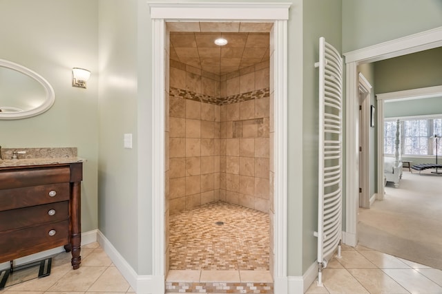1026 Essex St, Bangor, ME 04401 - full bathroom with tile patterned floors, tiled shower, vanity, and radiator