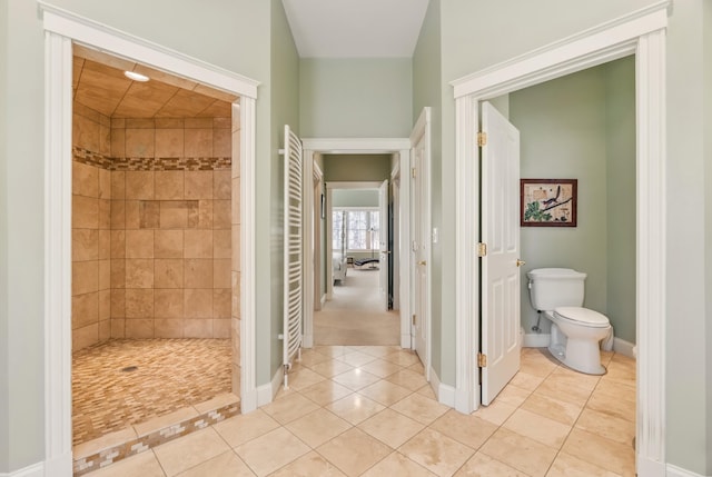 1026 Essex St, Bangor, ME 04401 - full bathroom with tile patterned floors, toilet, a shower stall, and baseboards