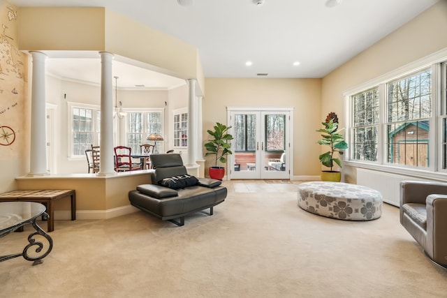 1026 Essex St, Bangor, ME 04401 - sitting room with carpet floors, ornate columns, baseboards, and recessed lighting