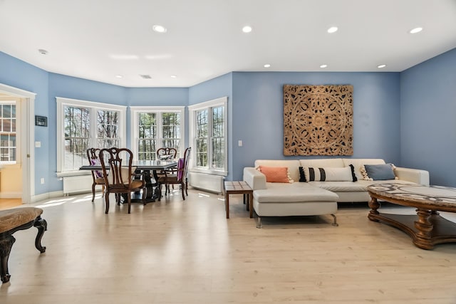 1026 Essex St, Bangor, ME 04401 - living room featuring light wood-style floors, recessed lighting, and baseboards