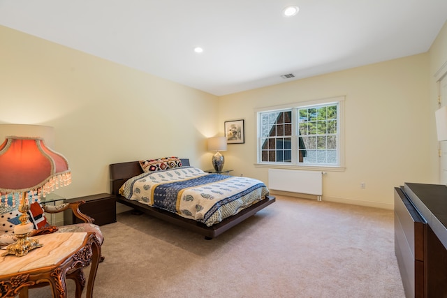 1026 Essex St, Bangor, ME 04401 - carpeted bedroom with radiator heating unit, recessed lighting, and baseboards