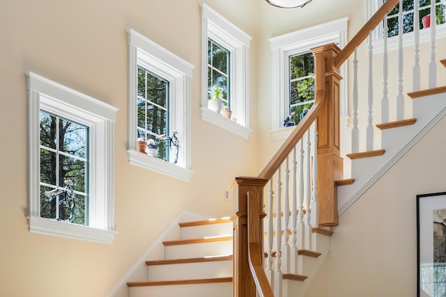 1026 Essex St, Bangor, ME 04401 - stairs featuring a high ceiling