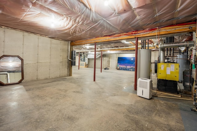 1026 Essex St, Bangor, ME 04401 - unfinished basement with a central vacuum unit and gas water heater