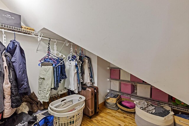 52 Casey Rd, Windsor, ME 04363 - walk in closet featuring wood finished floors and lofted ceiling