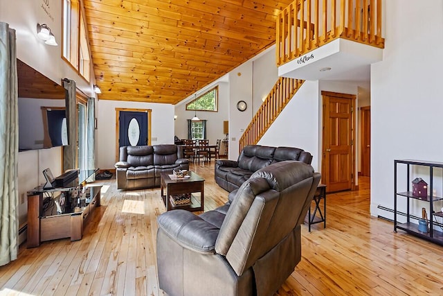 52 Casey Rd, Windsor, ME 04363 - living room with stairs, high vaulted ceiling, light wood-style flooring, and wood ceiling